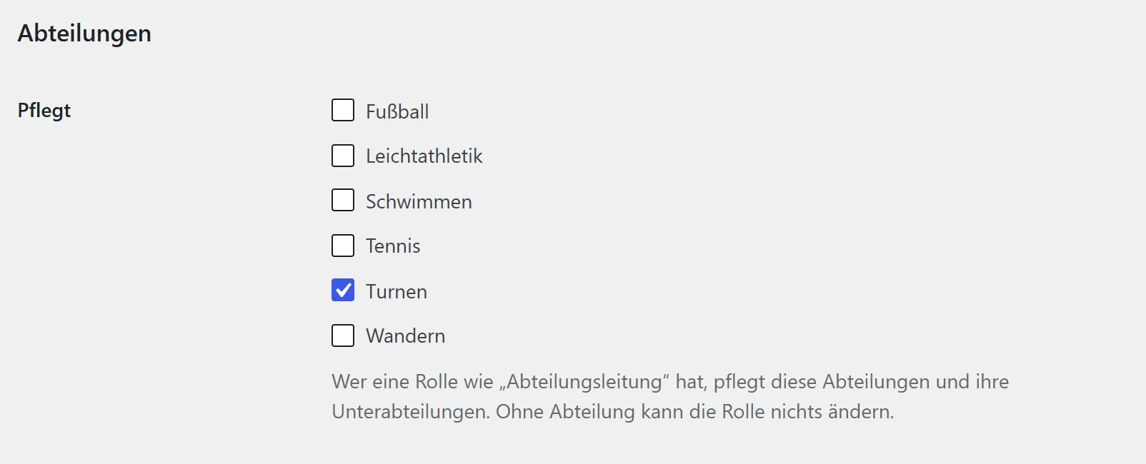 Der Abschnitt „Abteilungen“ im Profil des Benutzers. Die Zeile „Pflegt“ listet die sechs Abteilungen Fußball, Leichtathletik, Schwimmen, Tennis, Turnen und Wandern als Kästchen, nur „Turnen“ ist angehakt. Darunter steht: „Wer eine Rolle wie „Abteilungsleitung“ hat, pflegt diese Abteilungen und ihre Unterabteilungen. Ohne Abteilung kann die Rolle nichts ändern.“